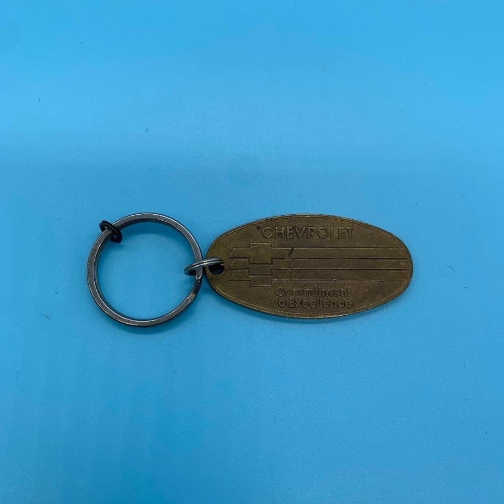 Vintage‎ Chevrolet Commitment to Excellence Metal Keychain Gold Tone Oval Tag